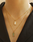 Moet Gemstone and Shell Pendant